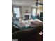 Large living room with sectional sofa and fireplace at 1158 Folkstone Dr, Mcdonough, GA 30253