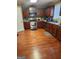 Kitchen with stainless steel appliances and hardwood floors at 1158 Folkstone Dr, Mcdonough, GA 30253