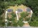 Aerial view of three homes with private driveways at 585 Highway 155 North N, Mcdonough, GA 30252