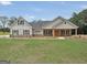 New craftsman style home with covered porch and large front yard at 585 Highway 155 North N, Mcdonough, GA 30252