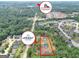 Aerial view highlighting a new home's lot and location within the community at 585 Highway 155 North N, Mcdonough, GA 30252