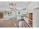 Modern kitchen with white cabinets, granite countertops, and ample storage at 585 Highway 155 North N, Mcdonough, GA 30252