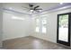 Bright living room with hardwood floors and access to backyard at 3299 Sims St, Hapeville, GA 30354