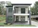 Modern two-story home with dark brick and white accents at 3299 Sims St, Hapeville, GA 30354