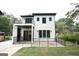 Modern home with back deck and fenced yard at 3299 Sims St, Hapeville, GA 30354