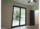 Bright bedroom with sliding glass doors leading to a private balcony at 3299 Sims St, Hapeville, GA 30354