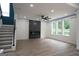 Spacious living room featuring a modern fireplace and hardwood floors at 3299 Sims St, Hapeville, GA 30354