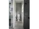 Small, modern bathroom with toilet and gray walls at 3299 Sims St, Hapeville, GA 30354