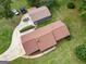 Aerial view of house, detached garage, and large yard at 5225 Bailey Sw Rd, Conyers, GA 30094