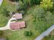 Aerial view of a sprawling property with a ranch house, detached garage, and trampoline at 5225 Bailey Sw Rd, Conyers, GA 30094