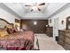 Main bedroom with king-size bed and ample closet space at 1204 Nottley Dr, Locust Grove, GA 30248