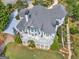 Aerial view of home showcasing expansive backyard and large deck at 115 Eagles Club Dr, Stockbridge, GA 30281