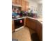 Kitchen with wood cabinets and appliances at 2237 Wind Rose Ct, Lithonia, GA 30058