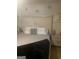 Main bedroom with large bed and nightstand at 2237 Wind Rose Ct, Lithonia, GA 30058