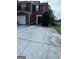 Brick townhouse with attached garage and private driveway at 2237 Wind Rose Ct, Lithonia, GA 30058