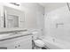 Modern bathroom with granite vanity and tiled shower/tub at 26 Pool Woods Dr, Grantville, GA 30220