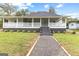 Charming renovated bungalow with a large front porch at 26 Pool Woods Dr, Grantville, GA 30220