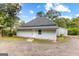 Rear view of house with gray siding at 26 Pool Woods Dr, Grantville, GA 30220