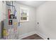 Laundry room with water heater and window at 26 Pool Woods Dr, Grantville, GA 30220