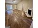 Living room with hardwood floors and fireplace at 753 Keys Ferry Rd, Mcdonough, GA 30252
