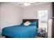 Bright bedroom with a full bed and window at 156 Revolutionary Dr, Hampton, GA 30228