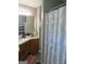 Bathroom with vanity and shower at 110 Gwenellen Dr, Locust Grove, GA 30248