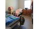 Bedroom with two twin beds and dresser at 110 Gwenellen Dr, Locust Grove, GA 30248