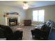 Living room with fireplace and hardwood floors at 110 Gwenellen Dr, Locust Grove, GA 30248