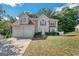 Two-story house with a two-car garage at 3203 Lower Creek Dr, Douglasville, GA 30135