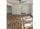 Spacious living room with hardwood floors and wainscoting at 4330 Cedar Valley Ln, Conley, GA 30288