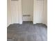 Simple bedroom with grey carpet and double closets at 4330 Cedar Valley Ln, Conley, GA 30288