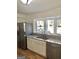 Kitchen features granite countertops and a large window at 4330 Cedar Valley Ln, Conley, GA 30288