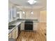 Modern kitchen with granite countertops and stainless steel appliances at 4330 Cedar Valley Ln, Conley, GA 30288