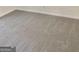 Grey carpeted bedroom with double closets at 4330 Cedar Valley Ln, Conley, GA 30288