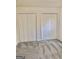 Spacious bedroom with grey carpet and double closets at 4330 Cedar Valley Ln, Conley, GA 30288