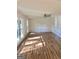 Large living room with hardwood floors and lots of natural light at 4330 Cedar Valley Ln, Conley, GA 30288