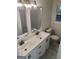 Updated bathroom with double vanity and subway tile at 4330 Cedar Valley Ln, Conley, GA 30288