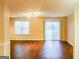 Bright living room with sliding glass doors to backyard at 675 Georgetown Ct, Jonesboro, GA 30236