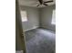 Simple bedroom with ceiling fan and closet at 1999 Lindsey Ln, Decatur, GA 30035