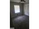 Simple bedroom with ceiling fan and closet at 1999 Lindsey Ln, Decatur, GA 30035