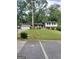 Ranch-style home with attached garage and a spacious yard at 1999 Lindsey Ln, Decatur, GA 30035