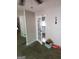 Open living room with French doors leading to kitchen at 1999 Lindsey Ln, Decatur, GA 30035