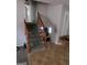 Wooden staircase leading to upper level at 1999 Lindsey Ln, Decatur, GA 30035