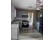 Gray kitchen with stainless steel appliances and granite countertops at 4139 Northstrand Dr, Decatur, GA 30035