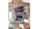 Spacious living room with stone fireplace and exposed wooden beams at 45 Carroll Ln, Temple, GA 30179