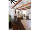 Spacious kitchen with island, stainless steel appliances, and exposed wooden beams at 45 Carroll Ln, Temple, GA 30179