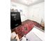 ’s bedroom with a twin bed, large rug, and ample closet space at 45 Carroll Ln, Temple, GA 30179