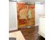 Rustic barn door with a weathered finish at 45 Carroll Ln, Temple, GA 30179