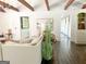 Living area featuring hardwood floors and exposed beams at 45 Carroll Ln, Temple, GA 30179