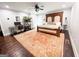 Main bedroom featuring a large bed, workspace and area rug at 45 Carroll Ln, Temple, GA 30179